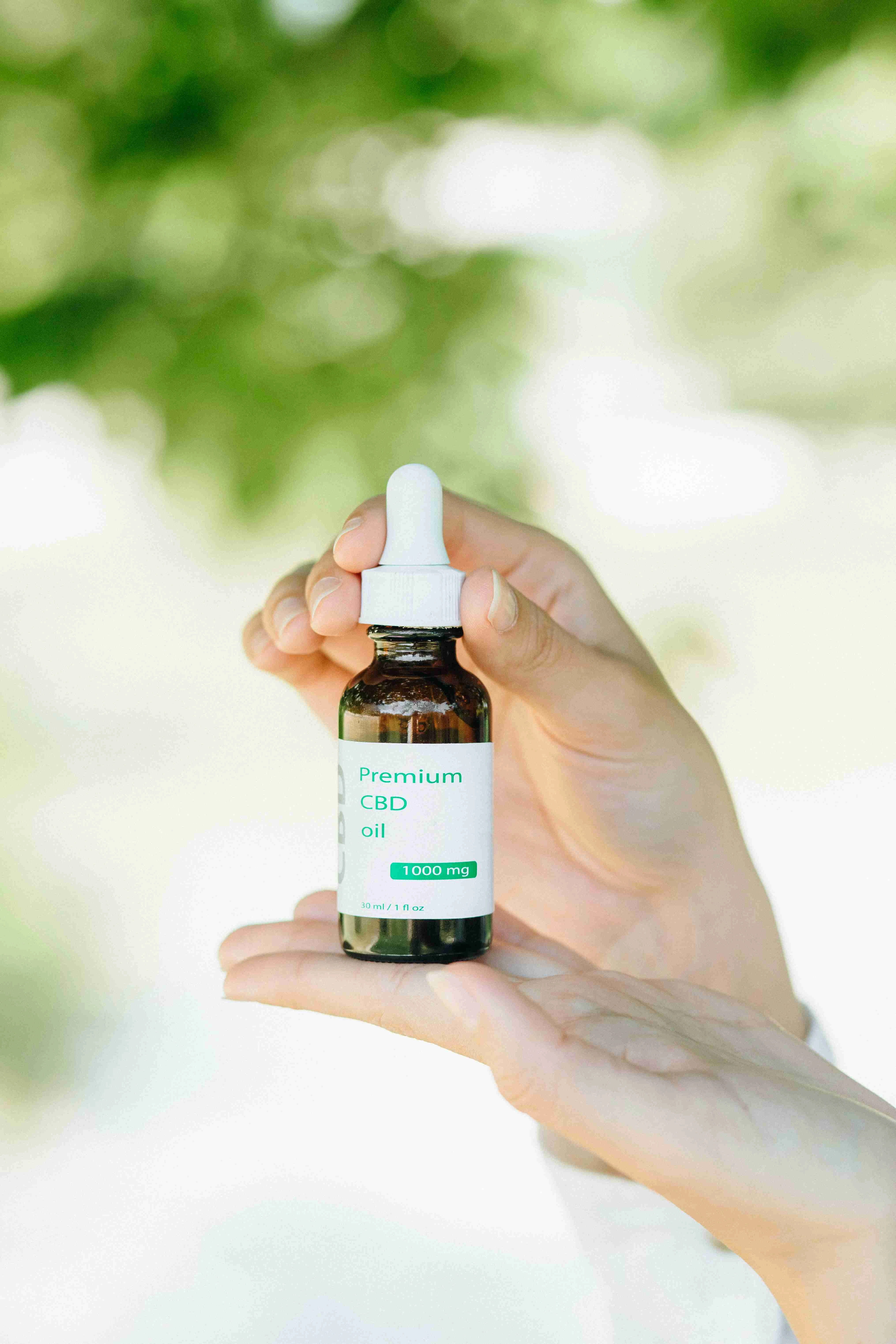 Premium CBD oil product showing high-quality medicinal cannabis extract with dropper for therapeutic applications